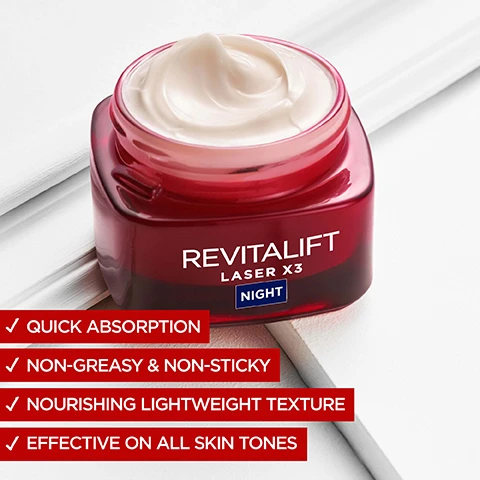 Image 4 - A jar of Revitalift Laser X3 night cream with a smooth, creamy texture sits on a white surface, featuring visible text that includes quick absorption, non-greasy & non-sticky, nourishing lightweight texture, and effective on all skin tones.
Image 5 - An image featuring three bowls containing different skincare ingredients: a yellow gel labeled Vitamin C with the text “Skin radiance,” a clear gel labeled Hyaluronic Acid with the text “Replump skin,” and a purple gel labeled Pro-Retinol with the text “Smooth wrinkles,” beside a jar of Revitalift Laser X3 Night cream.