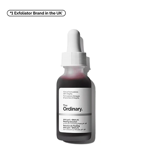 Image 1 - Image of a dark glass bottle of The Ordinary’s AHA 30% + BHA 2% Peeling Solution with a white dropper lid, labeled with phrases like Clinical Formulations with Integrity and *1 Exfoliator Brand in the UK.
Image 2 - An image featuring a red liquid with droplets on a light background, accompanied by three icons and text stating Exfoliates Multiple Layers of the Skin Surface, Improves Uneven Pigmentation, and Clears Pore Congestion.
Image 3 - A close-up image of a woman applying a red product to her cheek while displaying the words Exfoliating, Brightening, and Smoothing on the left side of the image.
Image 4 - Image of a dropper with red liquid, showing the title Key ingredients in AHA 30% + BHA 2% Peeling Solution and three descriptions: Alpha-hydroxy acids (AHA) Provides surface exfoliation for a smoother appearance. Beta-hydroxy acids (BHA) Salicylic acid exfoliates within pores to prevent congestion. Tasmanian pepperberry derivative Helps to support skin tolerance of direct acids.
Image 5 - An image showcasing a skincare regimen with four products labeled Squalane Cleanser, AHA 30% + BHA 2% Peeling Solution, Hyaluronic Acid 2% + B5, and Natural Moisturizing Factors + HA, accompanied by the text A regimen for hydrated and brighter-looking skin.
Image 6 - Image shows two skincare products titled Aha 30% + BHA 2% Peeling Solution and Glycolic Acid 7% Exfoliating Toner, with descriptions, benefits, and usage tips for each product: AHA solution is a 10-minute peel improving texture, tone, and targeting pores; Glycolic toner is for daily use, enhancing texture, tone, luminosity, and reducing scalp dryness.