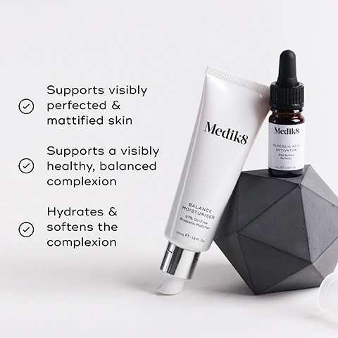 Image 1 - Image features two skincare products, a tube labeled Medik8 Balance Moisturiser and a bottle labeled Medik8 Glycolic Acid Activator, accompanied by text that outlines benefits: supports visibly perfected & mattified skin, supports a visibly healthy, balanced complexion, hydrates & softens the complexion.
Image 2 - Image features a marble surface with a creamy skincare product, and text descriptions highlighting three ingredients: Glycolic Acid, which exfoliates and perfects the skin; Prebiotics & Postbiotics, which support a healthy complexion; and Niacinamide, which helps reduce the appearance of oily skin.
Image 3 - Image showing a skincare routine chart divided into AM and PM sections with products listed under each: AM: cleanse, vitamin C, moisturise, sunscreen; PM: cleanse, direct acid, vitamin A, moisturise.