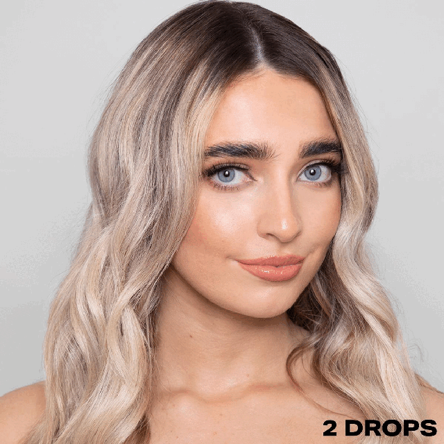GIF transitioning between two images. Image 1- modelling hair that has used the 'SHRINE Drop It Champagne Blonde Toner'. Text: 2 drops. Image 2- showing before and after use of the toner. Text: 2 drops