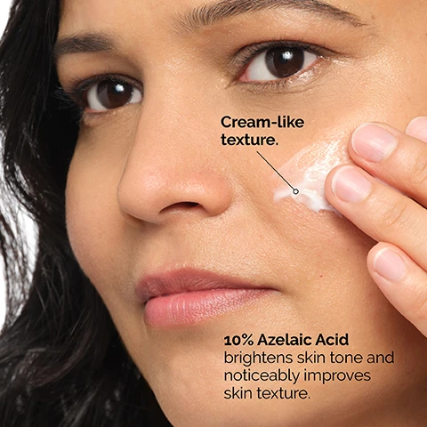 Image 1 - A close-up of a person applying a cream-like substance to their cheek, with text that reads Cream-like texture and 10% Azelaic Acid brightens skin tone and noticeably improves skin texture.
Image 2 - A textured white background with smooth curves featuring the text Apply daily in the morning and evening. Use sun protection during the day.
Image 3 - An image showing various skincare products in three categories: PREP with cleansers and toners, TREAT with water-based serums, eye serums, anhydrous solutions, and oils, and SEAL with suspensions, moisturizers, and SPF.