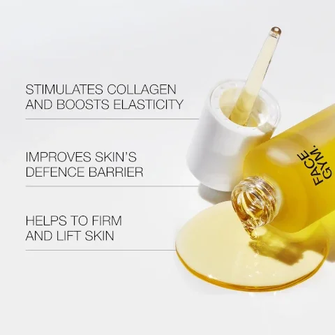 A bright yellow product bottle with FACE GYM. on its side is spilling golden liquid onto a white surface, next to an opened white cap with a dropper, and text on the left reads: STIMULATES COLLAGEN AND BOOSTS ELASTICITY, IMPROVES SKINS DEFENCE BARRIER, HELPS TO FIRM AND LIFT SKIN.