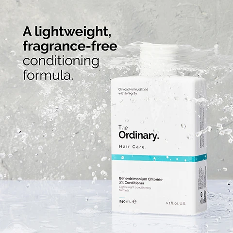 Image 1 - A bottle of The Ordinary Hair Care conditioner is submerged in water with splashes around it, featuring text that reads A lightweight, fragrance-free conditioning formula and visible product details on the label.
Image 2 - A hand is holding a bottle of hair care product that has a creamy texture pouring into the palm, with visible text stating 2% behentrimonium chloride smooths hair without weighing it down and creamy texture.
Image 3 - A person with wet, curly black hair is holding their hair with one hand, and the visible text in the image reads Work into wet hair. Rinse.