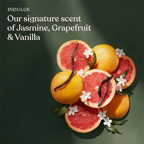 Image 1, Indulge our signature scent of jasmine, grapefruit and vanilla. Image 2, Made with dead sea salt, sweet almond oil.