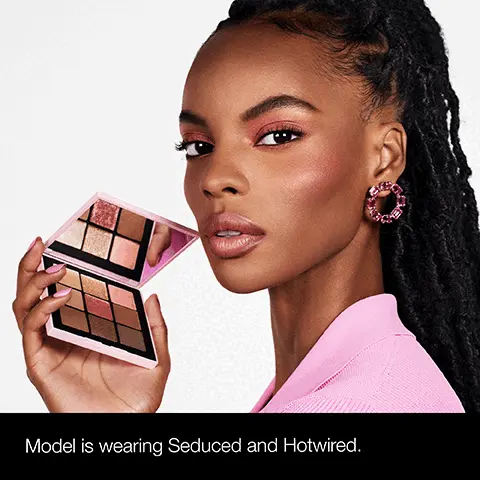 Model is wearing Seduced and Hotwired. 1, Reckless, Blend across the lid for a satin terracotta base. 2, High Speed, Apply under the browbone and at the inner corner of the eye for opal highlight. 3, Orgasm, Sweep peachy pink with golden shimmer on the center of lid as a radiant topper. 1, Faster Pussycat, Add warmth with metallic copper all over the eyelid. 2, Hotwired, Highlight under the browbone and at the inner corner of eye with golden shimmer. 3, Galapagos, Deepen outer corner of eyelid with matte chocolate and blend into the crease. 1, Orgasm, Sweep the iconic peachy pink with golden shimmer across the entire eyelid. 2, Seduced, Deepen the outer corner with sparkling amber. 3, Hotwired, Apply golden shimmer beneath the browbone for a soft, highlight effect. 4, Push It, Press deep warm chestnut along the upper lashline for targeted liner application.