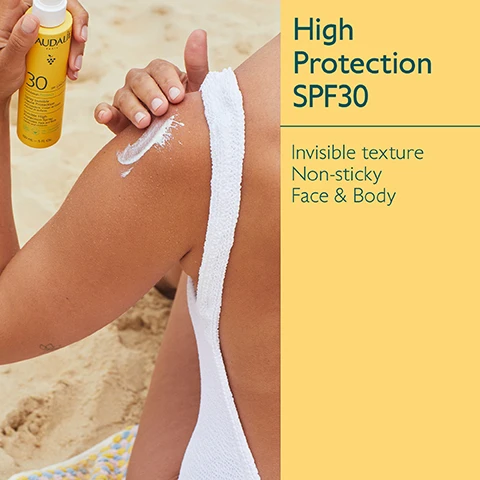 Image 1 - A person applying sunscreen to their shoulder while sitting on sand, with a bottle of sunscreen visible in their hand and text that says High Protection SPF30, Invisible texture, Non-sticky, Face & Body.
Image 2 - A bottle of Caudalie sunscreen spray with SPF 30 is placed on a yellow background, surrounded by green grapes and a white swirl of the sunscreen; visible text includes Grapeseed polyphenols Antioxidant & anti-wrinkle and Vitamin E Antioxidant.
Image 3 - An arrangement of yellow sunscreen products from the Vinosun Protect line by Caudalie, featuring a spray, cream, stick, sun water, and lightweight cream, with labels indicating their SPF levels, displayed against a yellow background. Text includes Vinosun Protect line, Spray SPF30/50, Cream SPF30/50+, Stick SPF50, Sun water SPF50+, and Lightweight Cream SPF50+.
Image 4 - Image shows a side-by-side comparison of two sun protection products: a spray bottle labeled High Protection Spray and a cream tube labeled High Protection Cream, with visible text outlining the benefits of each product, including fluid texture, cream texture, use for face and body, and invisible high protection.
Image 5 - A variety of sun protection products in yellow packaging are arranged on sand, with text stating Suitable for children from 3 years, UVA/UVB High Protection, and Green on scanner apps.