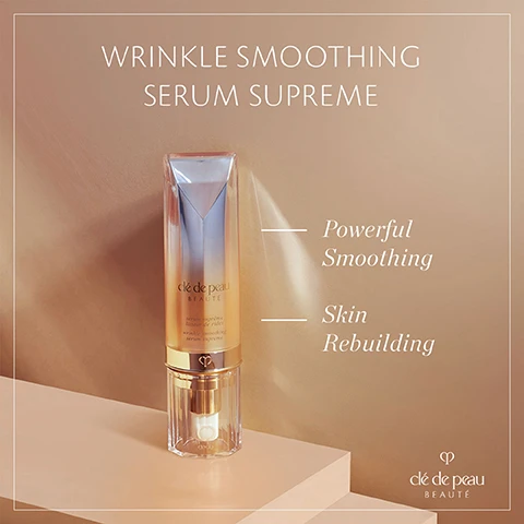 Image 1 - A bottle of Clé de Peau Beauté Wrinkle Smoothing Serum Supreme is displayed on a light background, with text that reads Wrinkle Smoothing Serum Supreme, Powerful Smoothing, and Skin Rebuilding.
Image 2 - A woman with long brown hair lightly touches her face while looking directly at the camera, and the image includes the text Visibly reduces DEEP WRINKLES Improving skin texture clè de peau BEAUTÉ.
Image 3 - A woman with medium skin and light brown hair holds a skincare product against her cheek, wearing gold earrings and a dark blouse, with text stating In 2 weeks, wrinkles visibly decrease in length & number and a footnote about tests conducted on women aged 31 to 55.