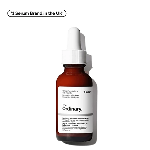 Image 1 - A brown glass bottle with a white dropper cap labeled The Ordinary containing Soothing & Barrier Support Serum and features the text *1 Serum Brand in the UK*.
Image 2 - A glossy, light pink substance is dripping from a tube, accompanied by three icon descriptors that say Repairs and Strengthens the Skin Barrier, Reduces the Look of Redness, and Improves Skins Hydration.
Image 3 - A person applying a pink skincare product to their cheek, with text that reads Repairs Barrier, Reduces Redness, and Improves Hydration.
Image 4 - Image shows a close-up of a pink serum with text listing key ingredients in a Soothing & Barrier Support Serum, including Centella Asiatica Phytotechnologies, Vitamin B12, Gallic Acid Derivatives, Soothing Complex, Bisabolol, Sugar-Based Hydrators, Ceramides, and Niacinamide.
Image 5 - A brown serum bottle with a dropper cap sits against a soft pink background with wavy texture, displaying the text Soothing & Barrier Support Serum and A multi-active serum designed to support skin-barrier repair, while soothing discomfort and reducing the look of redness.
Image 6 - Image shows a skincare regimen featuring three products labeled as PREP, TREAT, and SEAL, with the products being Squalane Cleanser, AHA 30% + BHA 2% Peeling Solution, and Natural Moisturizing Factors + HA, along with text describing their benefits for hydrated and brighter-looking skin.
Image 7 - A glossy pink cream is spread out on a white background with text below stating Repairs the skin barrier in 2 hours. *Clinical testing on 23 women after one application.