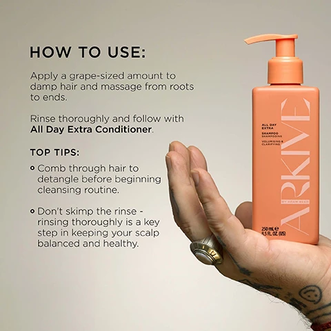 Image 3 - A persons hand holds a peach-colored ARKIVE shampoo pump bottle, placed beside text instructions, with the bottle itself labeled ARKIVE, All Day Extra, Shampoo, Shampooing, Volumising & Clarifying, By Adam Reed, 250 mL e, 8.5 FL. OZ. (US), and the accompanying instructions stating HOW TO USE: Apply a grape-sized amount to damp hair and massage from roots to ends. Rinse thoroughly and follow with All Day Extra Conditioner. TOP TIPS: Comb through hair to detangle before beginning cleansing routine. Dont skimp the rinse - rinsing thoroughly is a key step in keeping your scalp balanced and healthy. Image 4 - Two orange Arkive pump bottles, one shampoo and one conditioner, sit in a bubbly bath next to a persons arm, with on-image text pointing to Betaine for moisture & shine and Amaranth Peptide promotes fuller, thicker-looking hair, and bottle labels reading ARKIVE ALL DAY EXTRA SHAMPOO VOLUMISING & CLARIFYING 250 mL e 8.5 FL. OZ. (US) and ARKIVE ALL DAY EXTRA CONDITIONER VOLUMISING & HYDRATING. Image 6 - A close-up image shows a branch with small white flowers and dark green leaves, a partial view of an orange fruit, and a blurred light-colored object in the background, alongside text that reads Smells Like: Future Bloom A genderful floral fragrance that emulates a sun-soaked summer walk: liberating, luminous and full of potential. Head Notes Mandarin Rhubarb Heart Notes Jasmine Lily of the Valley Ground Notes Tea Rose Vanilla. Image 7 - Two orange Arkive shampoo and conditioner pump bottles, the first labeled ALL DAY EXTRA SHAMPOO SHAMPOOING VOLUMISING & CLARIFYING and the second labeled ALL DAY EXTRA CONDITIONER APRES SHAMPOOING VOLUMISING & HYDRATING, both are 250 ml e 8.5 FL. OZ. (US) BY ADAM REED, are set among green leaves, an orange slice, rhubarb, red berries, vanilla pods, and a white rose, accompanied by text MADE WITHOUT: ALUMINIUM AMMONIA LACTOSE LATEX MINERAL OIL PARABENS SILICONE SULPHATE GLUTEN TALC, and certification badges for VEGAN, Certified B Corporation, MADE WITH RECYCLED CONTENT, Cruelty Free International, and AWARD WINNING.