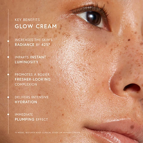 Image 2 - A close-up of a persons face showing radiant, moisturized skin with freckles, accompanied by text listing product benefits: KEY BENEFITS GLOW CREAM INCREASES THE SKINS RADIANCE BY 42%* IMPARTS INSTANT LUMINOSITY PROMOTES A ROSIER, FRESHER-LOOKING COMPLEXION DELIVERS INTENSIVE HYDRATION IMMEDIATE PLUMPING EFFECT *4 WEEKS, BISTORTA ROOT CLINICAL STUDY ON 44 PARTICIPANTS. Image 3 - An open white jar of Dr. Barbara Sturm Glow Cream with a light pink creamy texture and its slightly open lid is displayed, with the text KEY INGREDIENTS GLOW CREAM, DR. BARBARA STURM GLOW CREAM MADE IN GERMANY, LIGHT-REFLECTING PEARL PIGMENTS GIVE AN INSTANT SHIMMER TO THE SKIN, TRIPLE HYALURONIC ACID DELIVERS IMMEDIATE HYDRATION AND A PLUMPING EFFECT, POLYGONUM BISTORTA ROOT EXTRACT INCREASES RADIANCE BY 42%* AND SMOOTHS THE SKIN, WILD ROSE EXTRACT REFINES PORES FOR A MORE EVEN APPEARANCE, and *4 WEEKS, BISTORTA ROOT CLINICAL STUDY ON 44 PARTICIPANTS. Image 4 - An infographic on a light pink background illustrates the Enhanced STURMGLOW™ ROUTINE, presented in four vertical columns: CLEANSE shows a white pump bottle, labeled Dr. Barbara Sturm Molecular Cosmetics Cleanser Made in Germany, with accompanying text Step 1 Cleanser and sun and moon icons; HYDRATE shows a white dropper bottle, labeled Dr. Barbara Sturm Molecular Cosmetics Hyaluronic Serum Made in Germany, with accompanying text Step 2 Hyaluronic Serum and sun and moon icons; MOISTURIZE shows a white jar of cream, labeled Dr. Barbara Sturm Glow Cream Made in Germany, with accompanying text Step 3 Glow Cream and sun and moon icons; and SUPERCHARGE YOUR ROUTINE is split into two products: a white dropper bottle, labeled Dr. Barbara Sturm Molecular Cosmetics Glow Drops Made in Germany, with accompanying text Radiance Boost Glow Drops and a sun icon, and a white dropper bottle with a blue cap, labeled Dr. Barbara Sturm Molecular Cosmetics Night Serum Made in Germany, with accompanying text Night Repair Night Serum and a moon icon. Image 5 - An image displays two Dr. Barbara Sturm skincare products: on the left, a jar of Glow Cream, MADE IN GERMANY, described as RICH CREAMY MOISTURIZER, INTENSIVE HYDRATION, IMMEDIATE LUMINOSITY TO THE SKIN, APPLY AFTER CLEANSING & CLEAR SERUMS; and on the right, a dropper bottle of DR. BARBARA STURM MOLECULAR COSMETICS GLOW DROPS, MADE IN GERMANY, described as LIGHTWEIGHT SERUM, REVITALIZES TIRED SKIN, LIT-FROM-WITHIN GLOW, APPLY AFTER YOUR MOISTURIZER, with an overarching message USE TOGETHER FOR THE ULTIMATE STURMGLOW™.