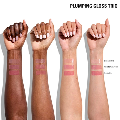 image 1, plumping gloss trio - pink trouble, rose temptation, berry kiss swatches on 4 different skin tones. image 2, pink trouble plumping gloss. image 3, rose temptation plumping gloss. image 4, berry kiss plumping gloss.