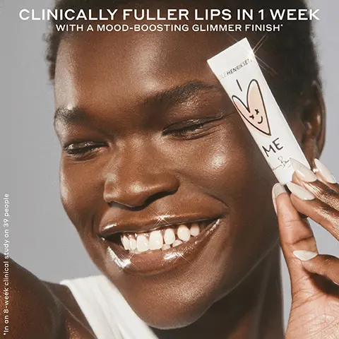 Image 1, In an 8-week clinical study on 39 people CLINICALLY FULLER LIPS IN 1 WEEK WITH A MOOD-BOOSTING GLIMMER FINISH OLEHENRIKSET ME Image 2, HENRIKSEN INSTANTLY reduces the look of lip lines' INSTANTLY hydrates + improves elasticity' ME Clinically fuller-looking lips in 1 WEEK "In an 8-week clinical study on 39 people Image 3, LIP-PLUMPING HYDRATION LIP-SPECIFIC PEPTIDES Help make lips look more defined + fuller KOKUM + MANGO SEED BUTTER Soothe, nourish + condition lips ACAI STEROLS Help strengthen skin barrier + boost hydration SCANDINAVIAN CLOUDBERRY OIL Packed with antioxidants + moisture; helps soften lips Image 4, COCOA CRÈME Chocolate brown tint Rich hot chocolate scent CITRUS SUNSHINE Sheer tint Fresh citrus scent CRÈME BRÛLÉE Beige-nude tint Vanilla brown sugar scent STRAWBERRY SORBET Mauve pink tint Freshly picked strawberry scent NEW + LIMITED EDITION IME by Anine Bing Mauve pink tint with rose gold glimmer Freshly picked strawberry scent Image 5, POUT PRESERVE LIP TREATMENT I ♡ ME STRAWBERRY SORBET GLIMMER BEFORE IMMEDIATELY AFTER Image 6, OLEHENRIKSEN An Bing Danish designer Anine Bing is the Global Scandi Brand Advisor for OLEHENRIKSEN. She stepped in as creative director on this limited-edition Pout Preserve shade inspired by self-love and micro moments of joy.