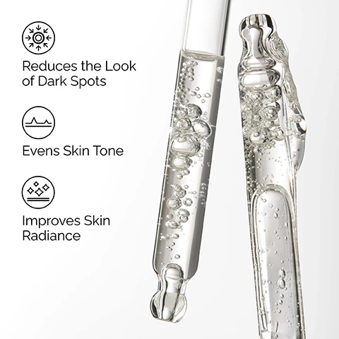 Image 1 - Two clear glass droppers filled with bubbly clear liquid are shown on a white background alongside three benefits: Reduces the Look of Dark Spots, Evens Skin Tone, and Improves Skin Radiance. Image 2 - Close-up of a persons face with a clear serum droplet on the cheek, featuring text labels Brightens, Evens Skin Tone, and Targets Dark Spots. Image 3 - A clear, bubbly liquid texture on a white background is shown next to text that reads Key ingredients in Alpha Arbutin 2% + HA: Alpha Arbutin Brightens skins appearance. Reduces the look of dark spots. Hyaluronic Acid Helps provide immediate and all-day hydration. Very-low molecular weight hyaluronic acid. Image 4 - The image displays a three-step The Ordinary skincare regimen, visually featuring a cleanser tube, two dropper bottles, and a moisturizer tube, with the main text A regimen for uneven skin tone and dullness. The steps are PREP Squalane Cleanser which Cleanses skin and removes makeup; TREAT including Hyaluronic Acid 2% + B5 that Hydrates and plumps the skin, and Alpha Arbutin 2% + HA which Reduces the look of dark spots and brightens; and SEAL with Natural Moisturizing Factors + HA which Supports the skin barrier.