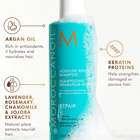 Image 1 - A bottle of Moroccanoil Moisture Repair Shampoo is shown with bubbles around it, featuring text that highlights ingredients and benefits: Argan Oil, Lavender, Rosemary, Chamomile, Jojoba Extracts, and Keratin Proteins.
Image 2 - A bottle of Moroccanoil Moisture Repair Conditioner is shown with a creamy texture dripping from the top, surrounded by icons and text describing its key ingredients: Argan Oil, Lavender, Rosemary, Chamomile, and Jojoba Extracts, with the message that it is color-safe and free from sulfates, phosphates, and parabens.