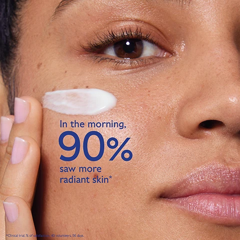 Image 1 - A close-up of a person applying cream to their cheek, with text stating In the morning, 90% saw more radiant skin* and a note about a clinical trial.
Image 2 - A jar of Caudalies Vinoperfect Glycolique Anti-Taches Night Cream is shown, with the top lid off revealing the cream inside, surrounded by grapes and text highlighting the benefits of Glycolic acid, Viniferine, and Papaya enzyme. Text on the image states: Glycolic acid (AHA) refines the skin texture, Viniferine 62x more effective than vitamin C corrects and prevents dark spots, Papaya enzyme exfoliates & brightens.
Image 3 - Image shows a side-by-side comparison of a womans face before and after using Vinoperfect Night Cream, with the left side depicting more skin blemishes and the right side showing improved skin radiance, along with text that states 90% saw more radiant skin and Untouched results after using Vinoperfect Night Cream daily for 2 months.
Image 4 - Image of two jars of night cream side by side; the left jar labeled Dark Spot Correcting Glycolic Night Cream with text stating anti-dark spots, enriched in Viniferine, reveal glowing skin; the right jar labeled Firming Night Cream with text stating anti-wrinkle, enriched with Vegan Collagen, visibly firm & lift.
Image 5 - A hand holds a jar of Caudalie Vinoperfect Night cream, with instructions on how to recharge it, reading How to recharge Vinoperfect Night cream, Recycle the empty refill in the recycling bin, and Keep the glass jar and lid and insert a new refill.
Image 6 - Image features a collection of skincare products from Caudalie, including a concentrated brightening glycolic essence, brightening eye cream, brightening micropeel foam, brightening dark spot serum, dark spot niacinamide moisturizer, glycolic peel mask, and dark spot correcting glycolic night cream, all set against a light blue background.