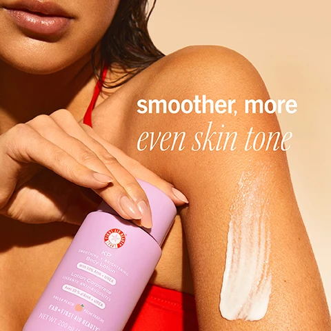 Image 1 - Close up of a persons arm and hand applying white lotion from a purple bottle of KP Smoothing + Brightening Body Lotion with 10% AHA + Urea, with overlaid text reading smoother, more even skin tone.
Image 2 - Alt text generation failed
Image 3 - A purple bottle of First Aid Beauty lotion is shown with peaches and water droplets, displaying text Ingredient Highlights: LACTIC ACID: Exfoliates + improves skin texture GLYCERIN + UREA: Helps smooth + hydrate skin FIRST AID BEAUTY KP SMOOTHING + BRIGHTENING Body Lotion With 10% AHA + UREA Lotion Corporelle LISSANTE ANTI-RUGOSITES Avec 10 % dAHA + UREA FRESH PEACH PÊCHE FRAÎCHE FAB FIRST AID BEAUTY NET WT. 200 mL (6.7 FL OZ).
Image 4 - Close-up of a person biting into a peach slice with the text JUICY peach scent No artificial fragrance.
Image 5 - A swirl of white cream with red text that reads 97% of consumers with KP said this product made their skin look healthier + feel soft* and smaller grey text that reads *in a consumer perception study with 35 participants with KP after 10 days.
Image 6 - A person applies a creamy product to their thigh with the text multitasking benefits: o Hydrates o Exfoliates o Smooths o Evens Skin Tone.
Image 7 - The image shows a First Aid Beauty KP Bump Eraser Body Scrub tube and a KP Smoothing + Brightening Body Lotion bottle with cut peaches, alongside the visible text FIRST AID BEAUTY KP BUMP ERASER BODY SCRUB KP SMOOTHING + BRIGHTENING Body Lotion scrub + lotion 3x smoother skin: exfoliates, hydrates, softens.