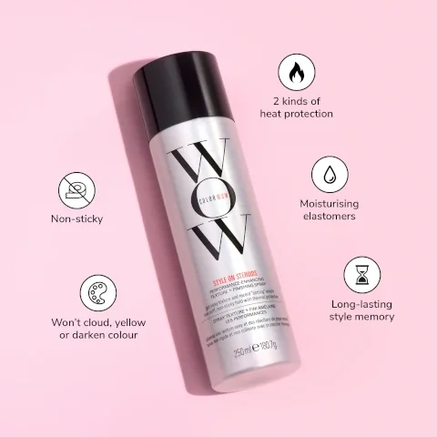 A silver spray bottle labeled WOW is centered on a pink background, with icons and text surrounding it highlighting features such as non-sticky, two kinds of heat protection, moisturizing elastomers, and long-lasting style memory; visible text reads STYLE ON STEROIDS PERFORMANCE-ENHANCING TEXTURE-FINISHING SPRAY 250 ml e 180.7 g.