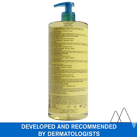 Image 1 - A large, transparent bottle of soothing shower and bath oil with a pump top, featuring a yellow liquid inside and extensive product information in different languages on the back, alongside the text DEVELOPED AND RECOMMENDED BY DERMATOLOGISTS at the bottom.
Image 2 - A close-up image of a womans shoulder with a drop of oil on it, her hand gently resting on her skin, accompanied by text that states Mild foaming nourishing gel-in-oil and Face & Body, along with VERY DRY SKIN - PRONE TO ATOPY at the bottom.
Image 3 - A close-up image of a young boy with curly hair resting against a woman with long, straight hair, both smiling softly; text on the image states -75% of tightness and Cleanses & soothes itching sensation.
Image 4 - An infographic titled Advanced Dermatological Formula features several key ingredients with their benefits, including a patent for Cerasterol-2F, Shea Butter Extract, Glycerin 19%, and Uriage Thermal Water alongside icons representing each extract.
Image 5 - A scenic view of snow-capped mountains reflected in a lake with text stating Recommended by dermatologists, Suitable for patients on cancer treatment, Fragrance-free, Soap-free & Preservative free, and Physiological pH.