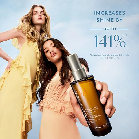 Image 1 - Two women, one blonde in a yellow dress and one with dark hair in a peach dress, pose against a blue sky, with the dark-haired woman holding a bottle of Moroccanoil Treatment Mist, beside text that reads INCREASES SHINE BY up to 141% *Based on an independent lab study. Results may vary. and text on the bottle that reads MOROCCANOIL TREATMENT MIST For all hair types TRAITEMENT MOROCCANOIL BRUME Pour tous les types de cheveux ULTRA-LIGHT. Image 2 - A brown Moroccanoil hair product bottle with a gold pump leans on a reflective surface against a light blue background, with two circular icons and associated text describing ingredients on the right, displaying the text: MOROCCANOIL, M, MOROCCANOIL TREATMENT MIST, For all hair types, TRAITEMENT MOROCCANOIL BRUME, Pour tous les types de cheveux, ULTRA-LIGHT, ARGAN OIL Rich in antioxidants and essential fatty acids to help hydrate and soften hair, LINSEED EXTRACT A good source of alpha-linolenic acid, which helps improve hair health. Image 3 - A split image shows a womans dark brown hair from behind, with the left side labeled BEFORE displaying frizzy hair and the right side labeled AFTER displaying smooth, shiny hair with defined waves.