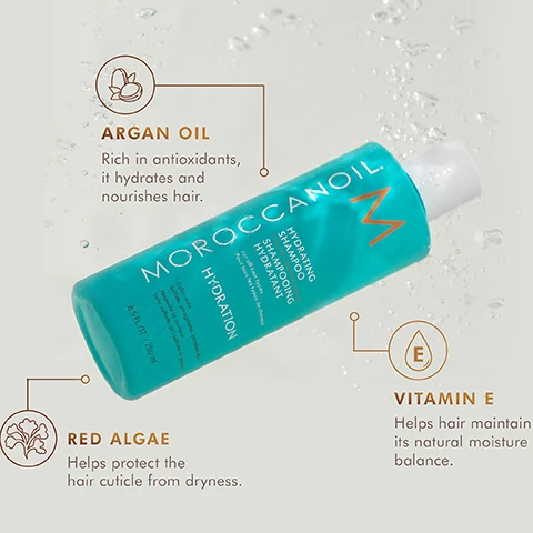 Image 3 - A teal Moroccanoil Hydrating Shampoo bottle, shown on a light background with water droplets, highlights three key ingredients: Argan Oil, rich in antioxidants, which hydrates and nourishes hair; Red Algae, which helps protect the hair cuticle from dryness; and Vitamin E, which helps hair maintain its natural moisture balance; the bottle label also reads Moroccanoil M HYDRATING SHAMPOO SHAMPOOING HYDRATANT for all hair types pour tous les types de cheveux HYDRATION Color-safe Sulfate, phosphate, paraben-free Respecte la couleur Sans sulfate, phosphate ni paraben 8.5 FL.OZ. / 250 ml. Image 4 - A white Moroccanoil Hydrating Conditioner bottle is shown partially submerged in water, with surrounding text detailing its key ingredients and benefits: ARGAN OIL Rich in antioxidants, it hydrates and nourishes hair; VITAMIN E Helps hair maintain its natural moisture balance; RED ALGAE Helps protect the hair cuticle from dryness; the bottle itself reads MOROCCANOIL HYDRATING CONDITIONER APRES-SHAMPOO HYDRATANT For all hair types Pour tous les types de cheveux HYDRATION Color-safe Sulfate, phosphate, paraben-free Respecte la couleur Sans sulfates, phosphates ni parabènes 8.5 FL.OZ. / 250 ml. Image 5 - The image shows golden-yellow oil droplets on a white background with text that reads KEY INGREDIENTS, ARGAN OIL Rich in antioxidants, it hydrates and nourishes hair, and LINSEED EXTRACT Contains fatty acids to help improve the health of hair.